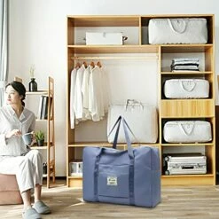 Portable Travel Duffel Bag, Large Capacity Foldable Tote Shoulder Bag, Lightweight Waterproof Carry On Luggage Sport Gym Bag (Light Blue) -suitcase shop 5195JJUHeCL